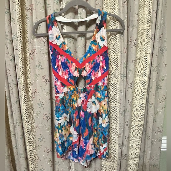 REVOLVE Pants - Revolve NBD x The Naven Twins Floral Cutout Romper Size Small EUC‎